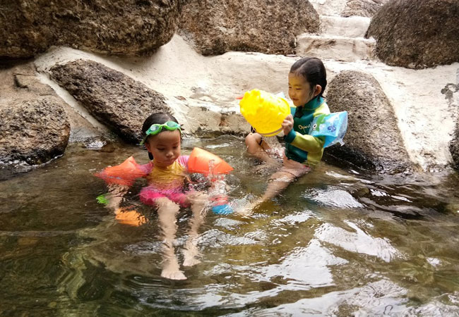 children in hot spring